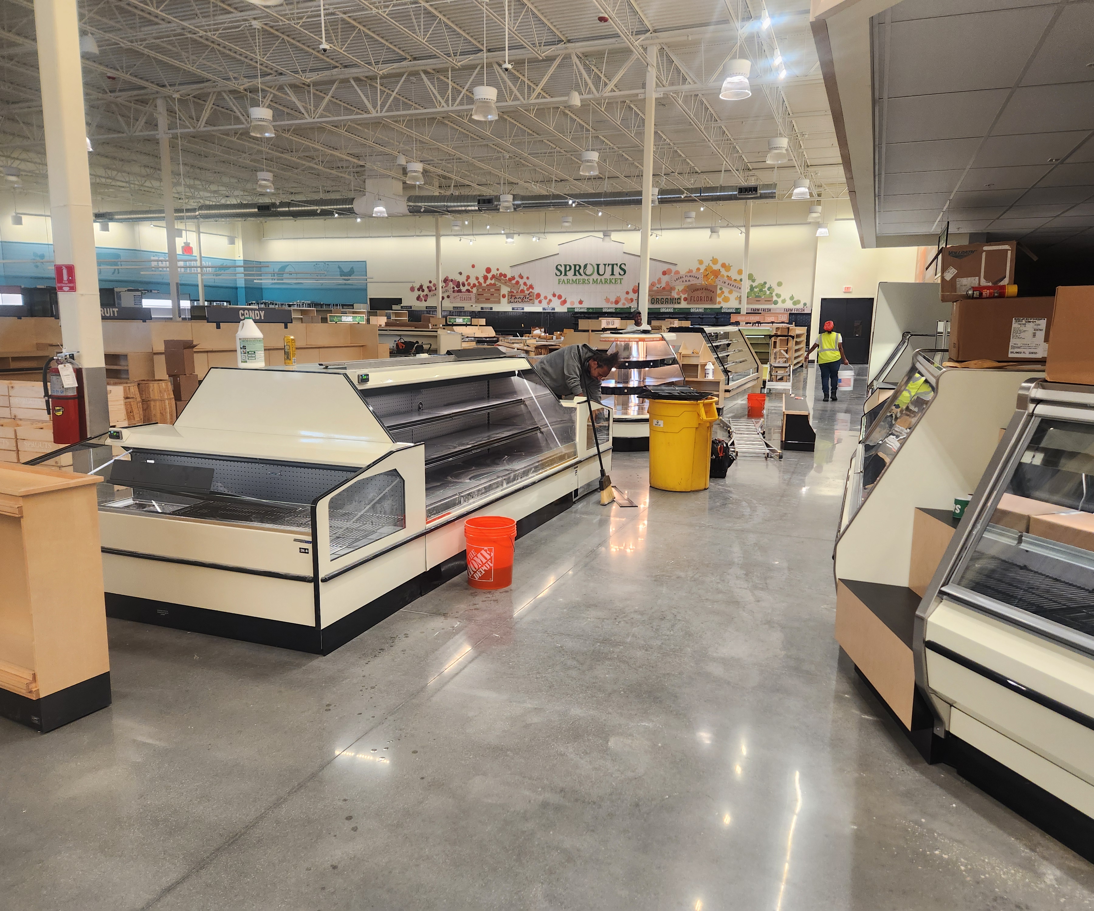 Clean commercial interior concrete floor after post-construction cleaning