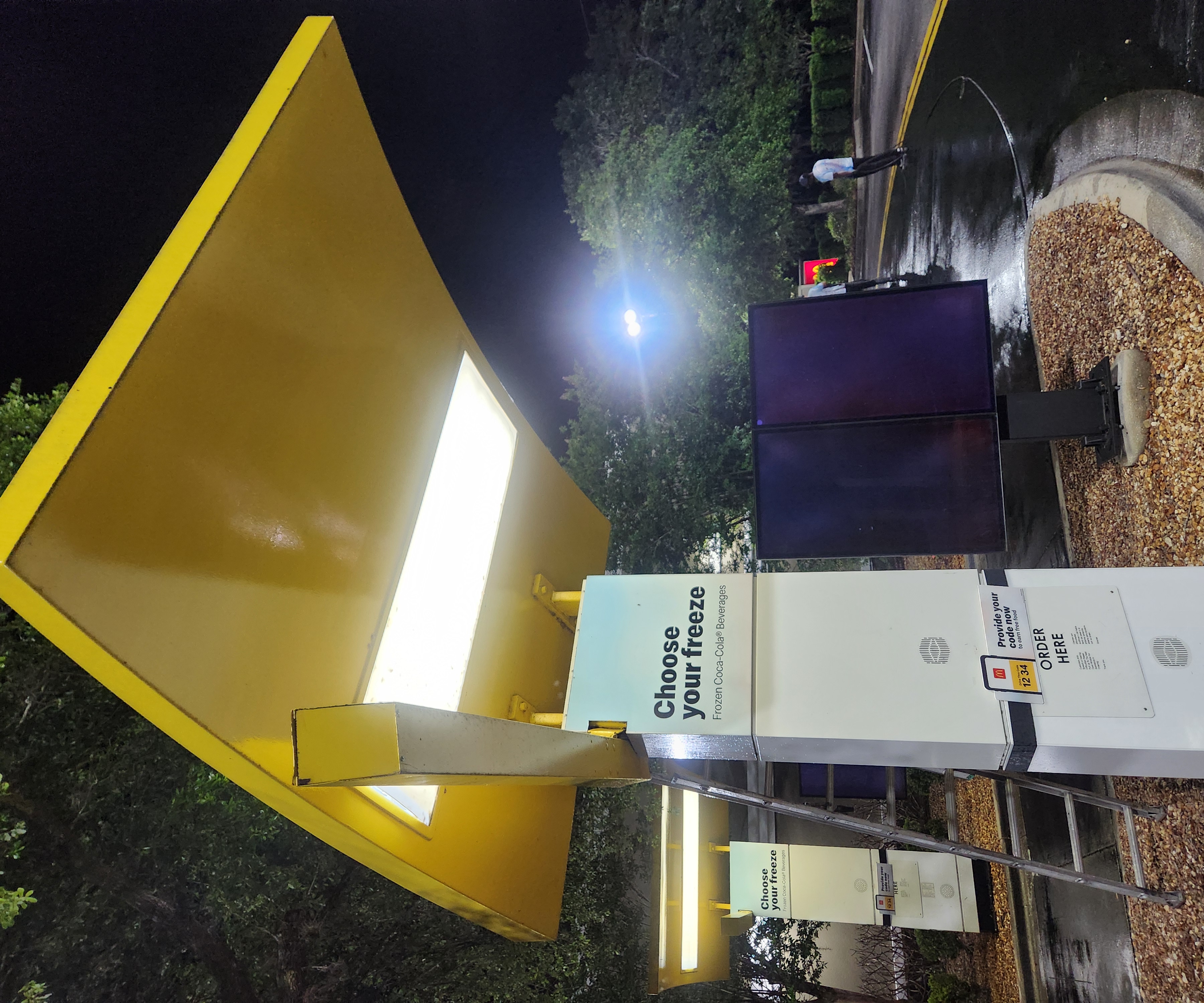 Clean commercial signage and canopy after post-construction pressure washing